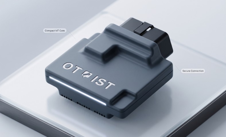 Close-up of the Otoist OBD-II device showing its compact body, status LED, and OBD-II connector
